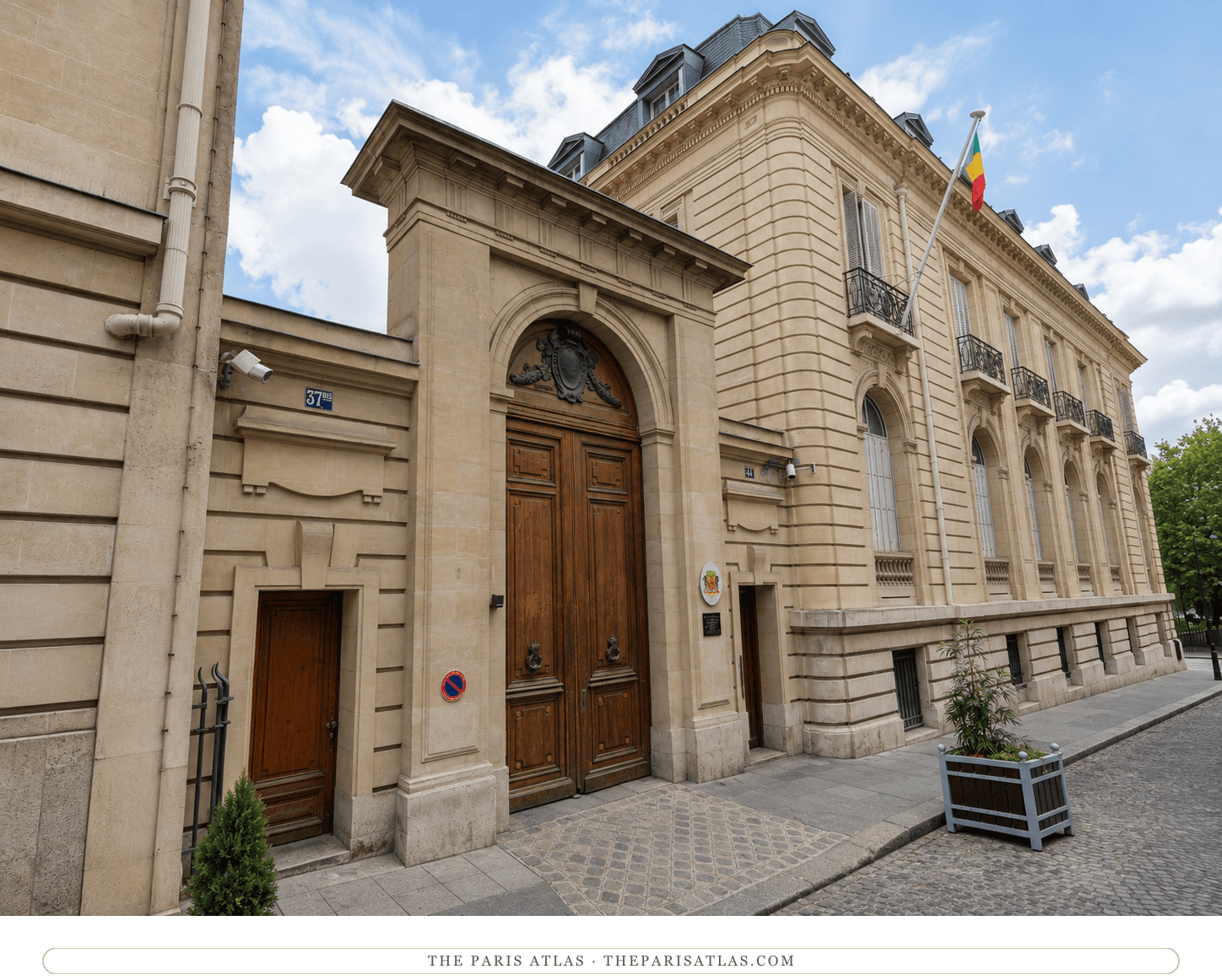 Illustration of the corner of rue Paul-Valéry today, where a later stone building flying a national flag stands on the site