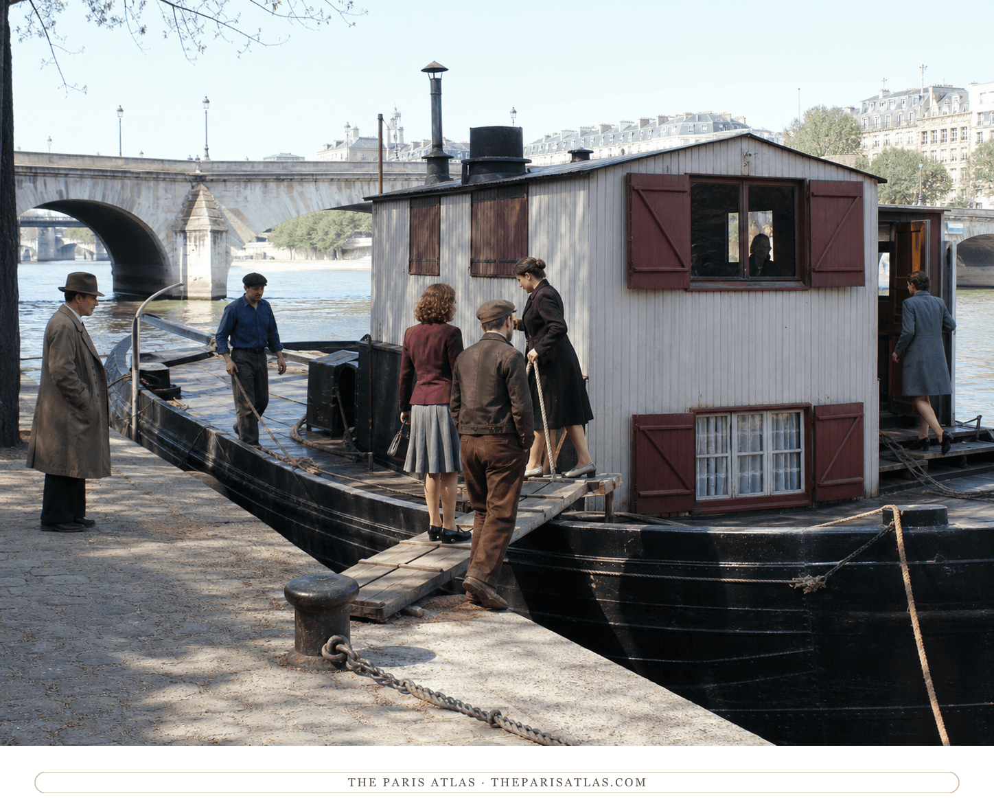 Anonymous visitors crossing the gangplank of La Belle Aurore in a 1938 reconstruction