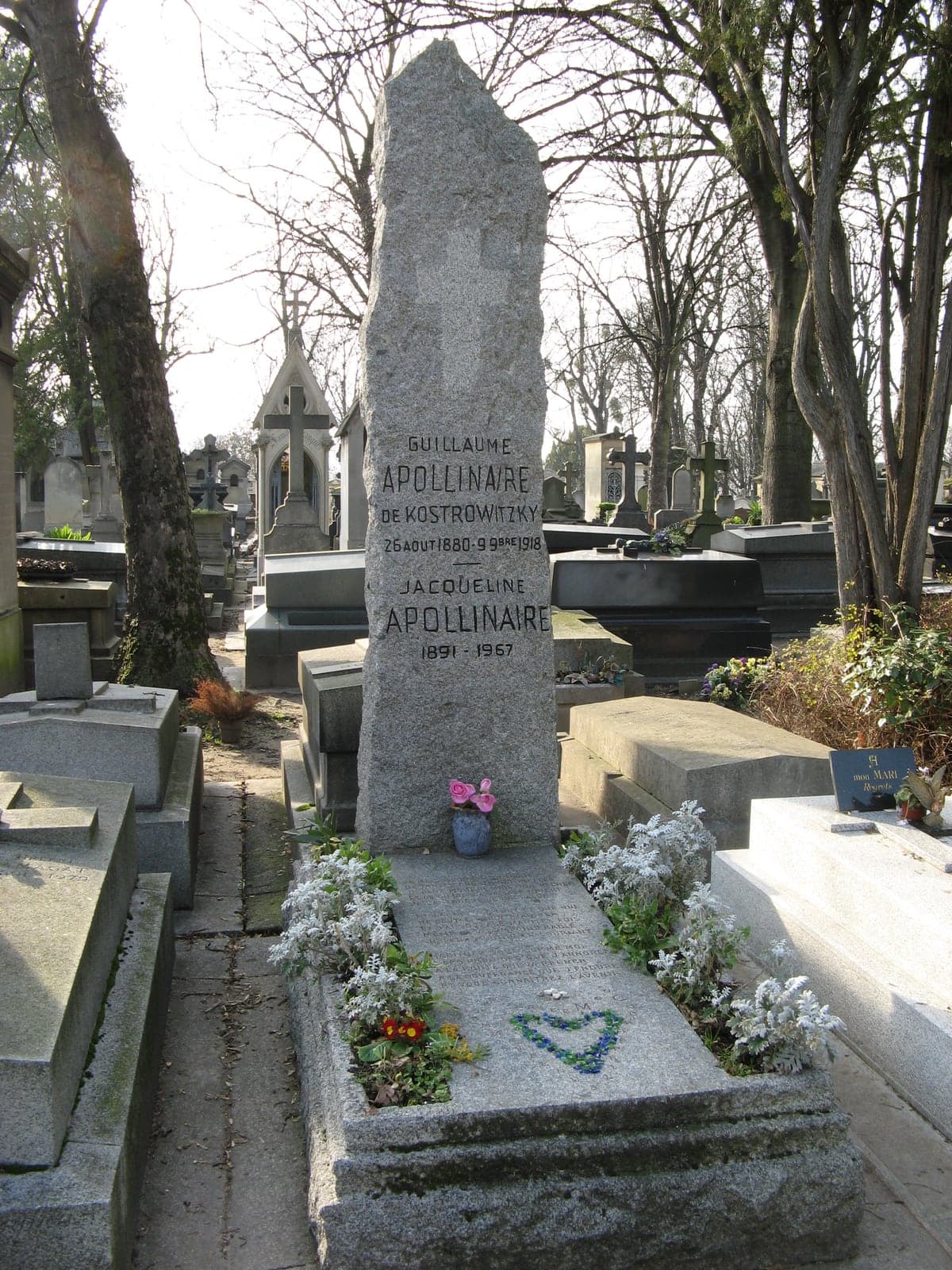 Guillaume Apollinaire's menhir-like granite gravestone in division 86 of Père-Lachaise
