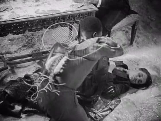 Féral Benga as the Black Angel bending over the child in The Blood of a Poet