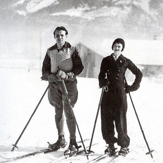 Louis-Ferdinand Céline and Elizabeth Craig standing on skis in the Alps, 1931; Craig wears a knit cap.