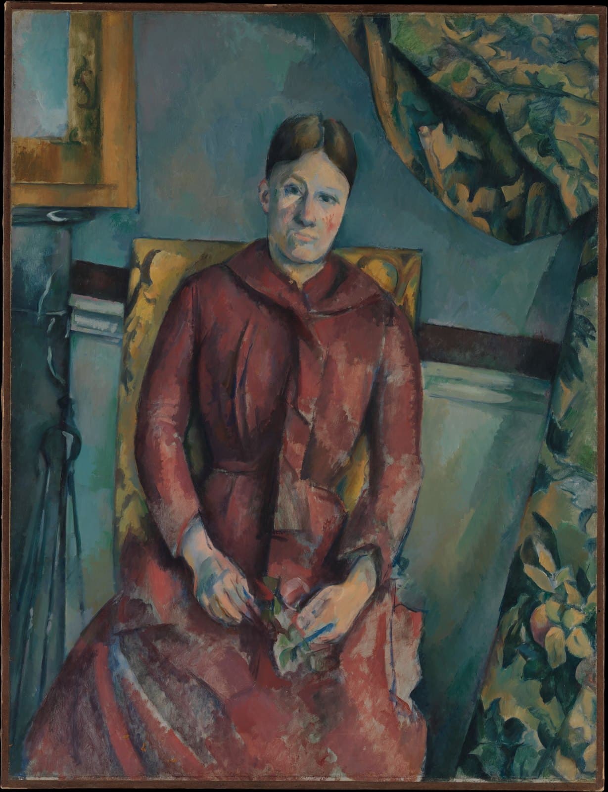 Cézanne's portrait of Hortense Fiquet in a red dress, seated in a yellow armchair with her hands folded
