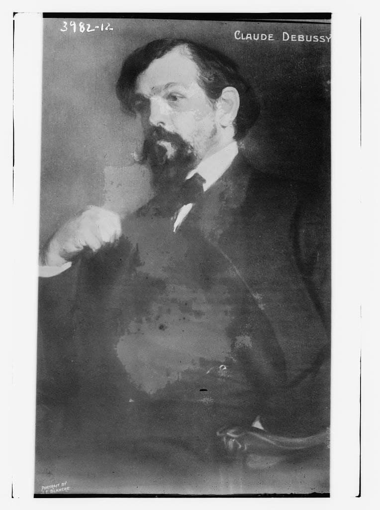 Claude Debussy in a formal studio portrait held by the Library of Congress
