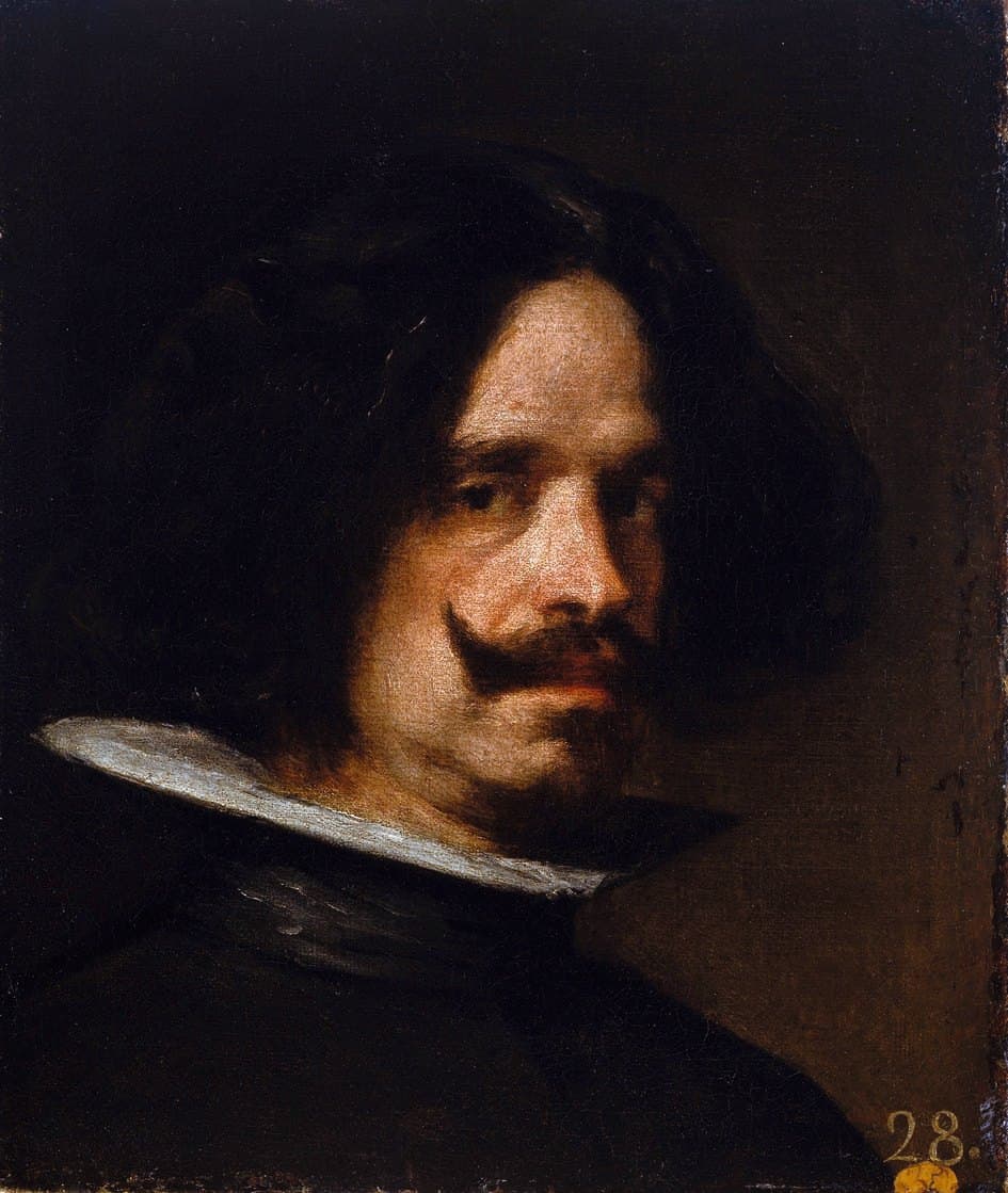 A bust-length portrait of a man in his fifties turned slightly to the right against a dark background. He has long dark hair falling to his shoulders, a thin moustache and a small goatee, and looks directly out with a calm, level gaze. He wears a plain dark coat with a narrow white collar.