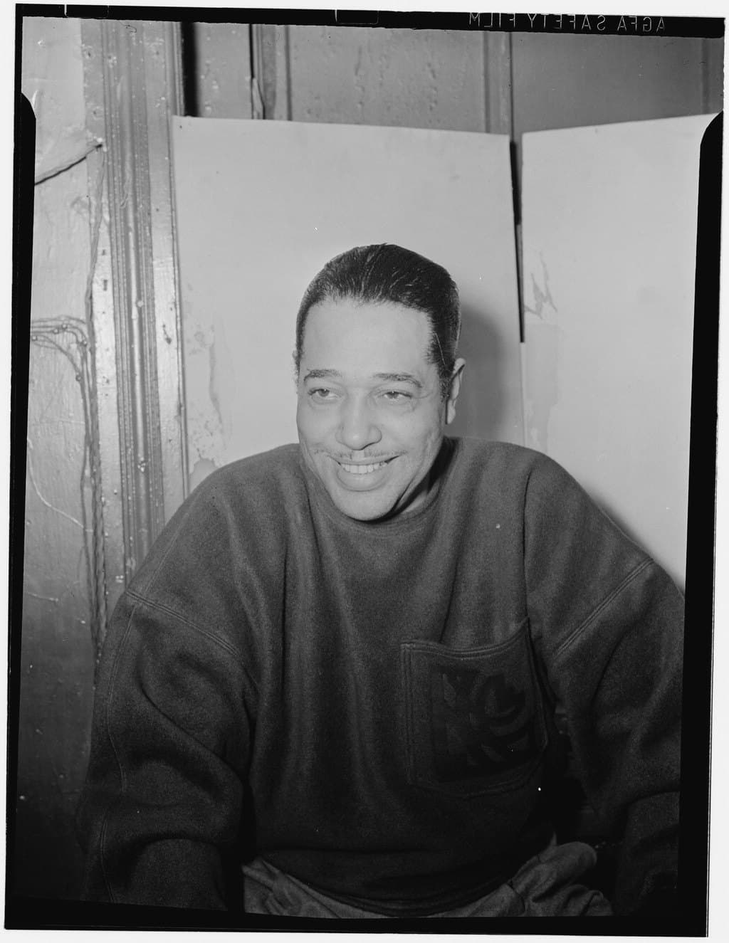 Duke Ellington seated at the piano at the Zanzibar nightclub in New York around July 1946