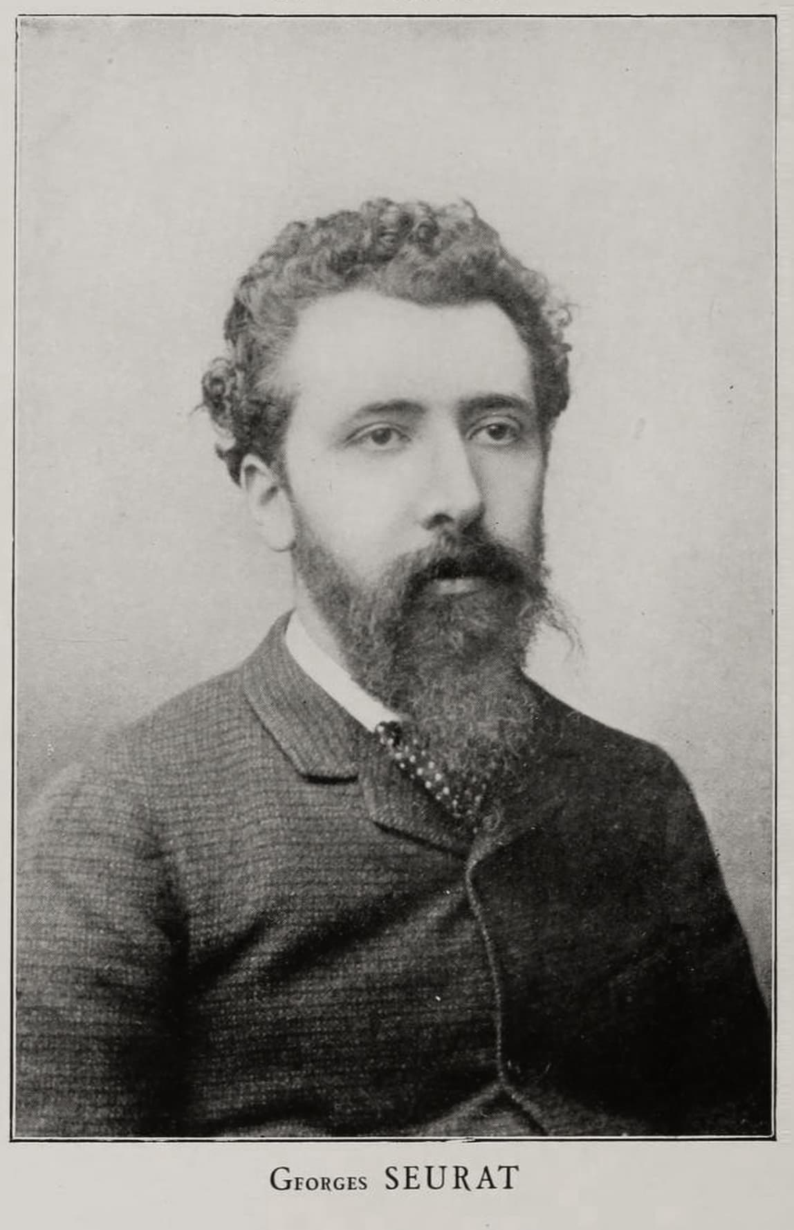 Georges Seurat at twenty-eight, in a dark coat with a neat beard, photographed in three-quarter profile