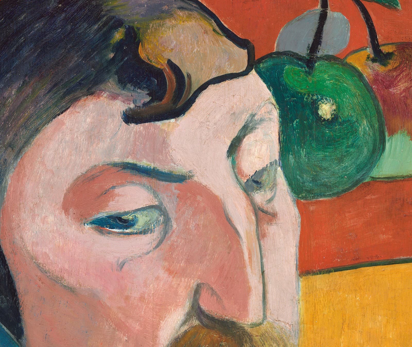 Detail of Self-Portrait with Halo and Snake: Gauguin's downcast eyes and exaggerated nose beside a hanging green apple