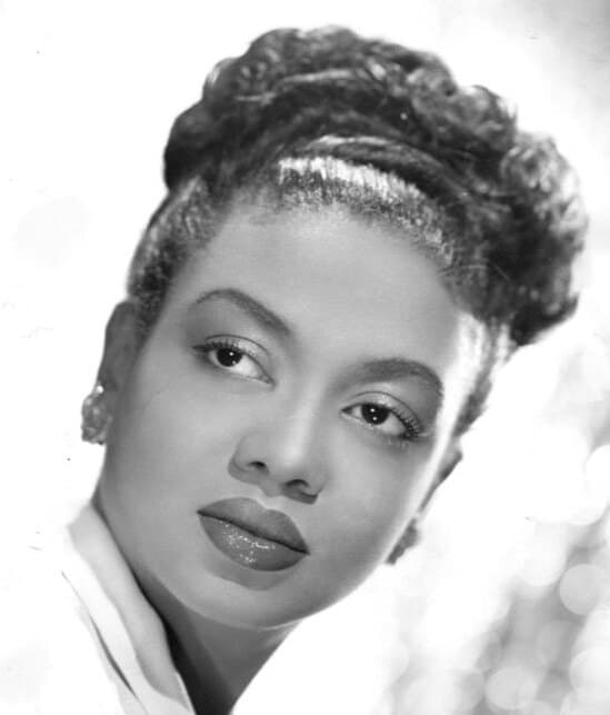 Hazel Scott smiling in a 1947 studio portrait