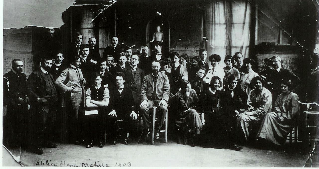 A group photograph of Henri Matisse with the students of his Paris academy in 1909