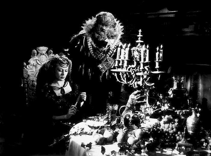 Studio Harcourt portrait of Josette Day and Jean Marais, 1946, heads close together in dramatic studio light