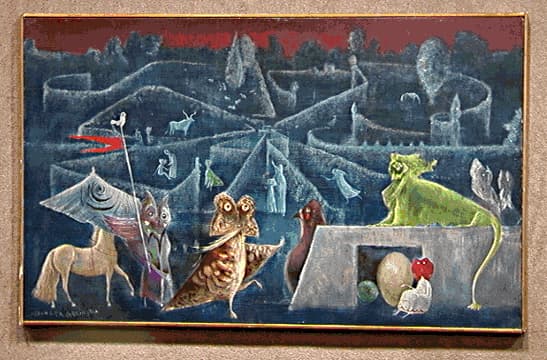Leonora Carrington at ninety-three, white-haired, seated and speaking, her hands raised mid-gesture