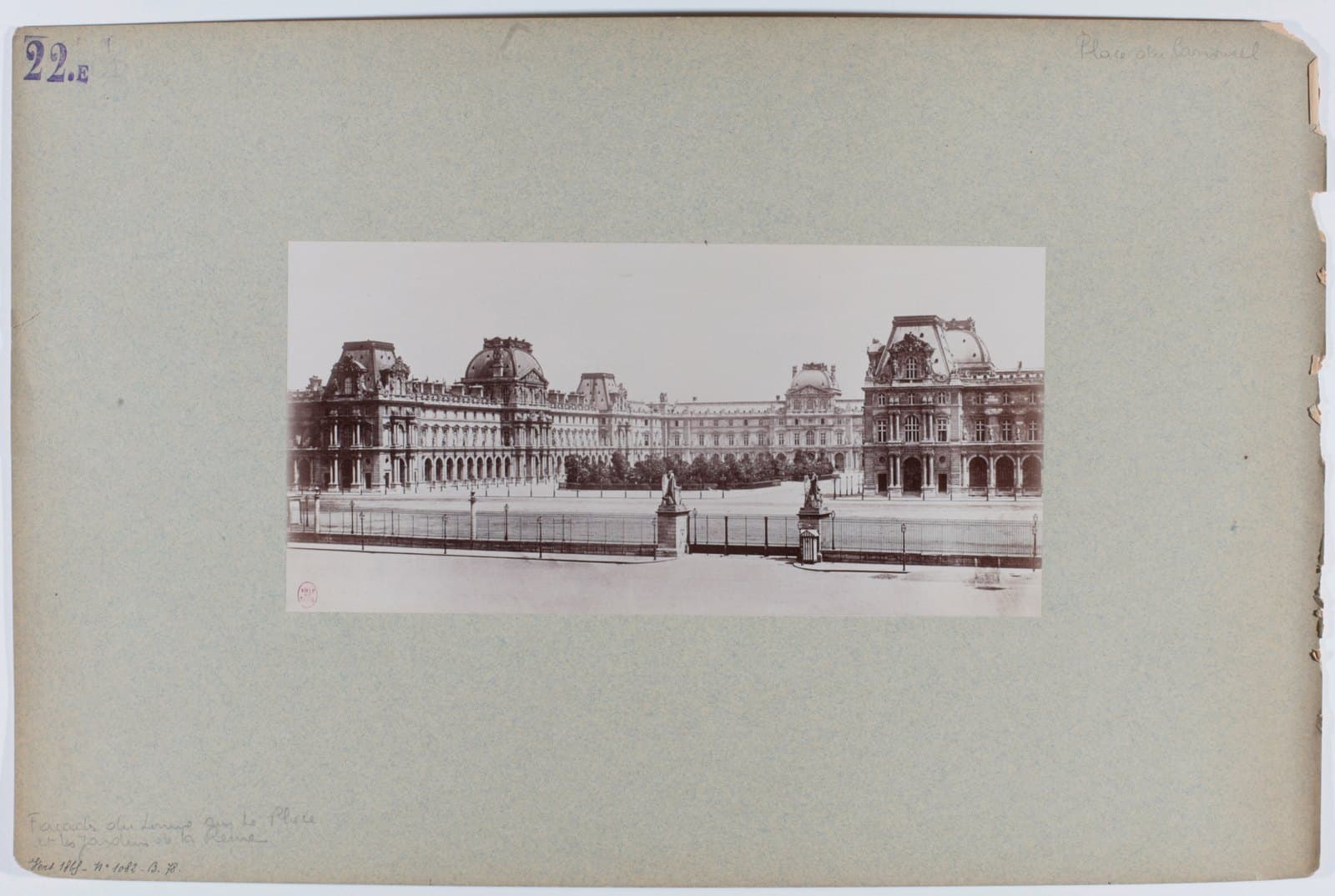 The Louvre palace behind the Jardin de la Reine around 1865, with an iron gate and paths in the foreground
