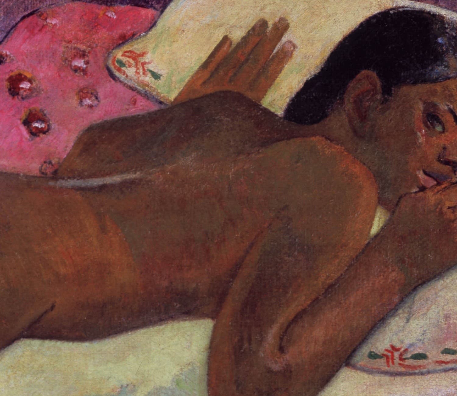 Detail of Manao tupapau: the girl's face turned sideways toward the viewer, eyes wide, hands drawn up beside her mouth on the pillow