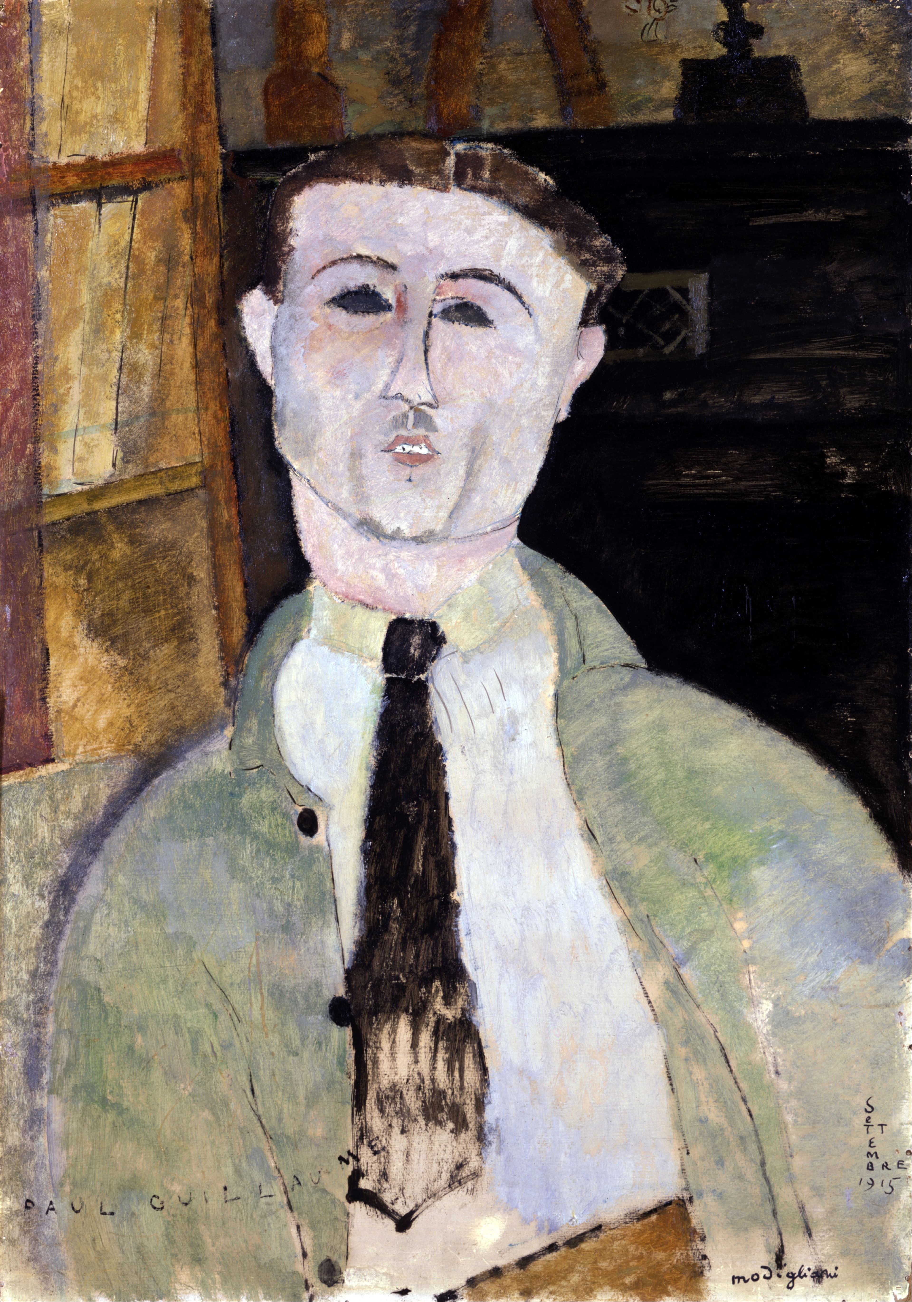 Modigliani's 1915 portrait of Paul Guillaume: a pale, mask-like face with blank almond eyes, dark hair, small moustache, green jacket and black tie, inscribed PAUL GUILLAUME at lower left