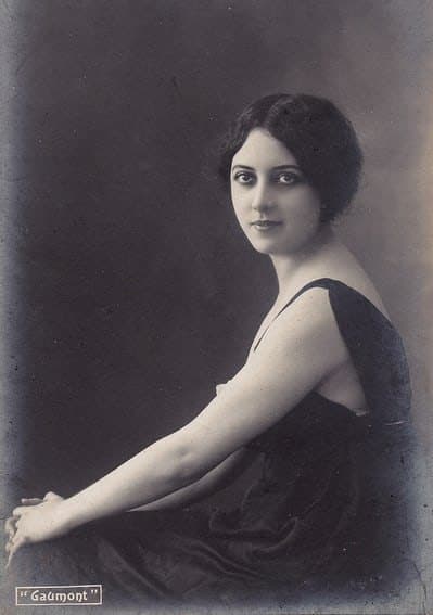 Studio portrait of Musidora out of costume, in a dark dress, during her Gaumont years