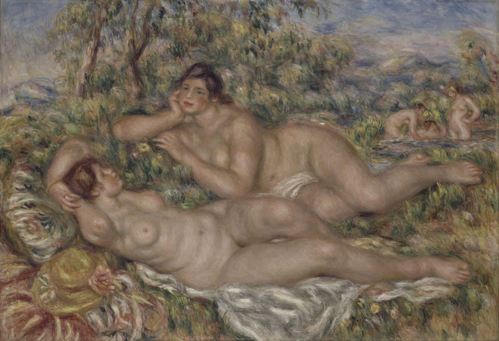 Renoir's late Bathers: two ample reclining nudes in a warm Mediterranean landscape painted in reds and golds