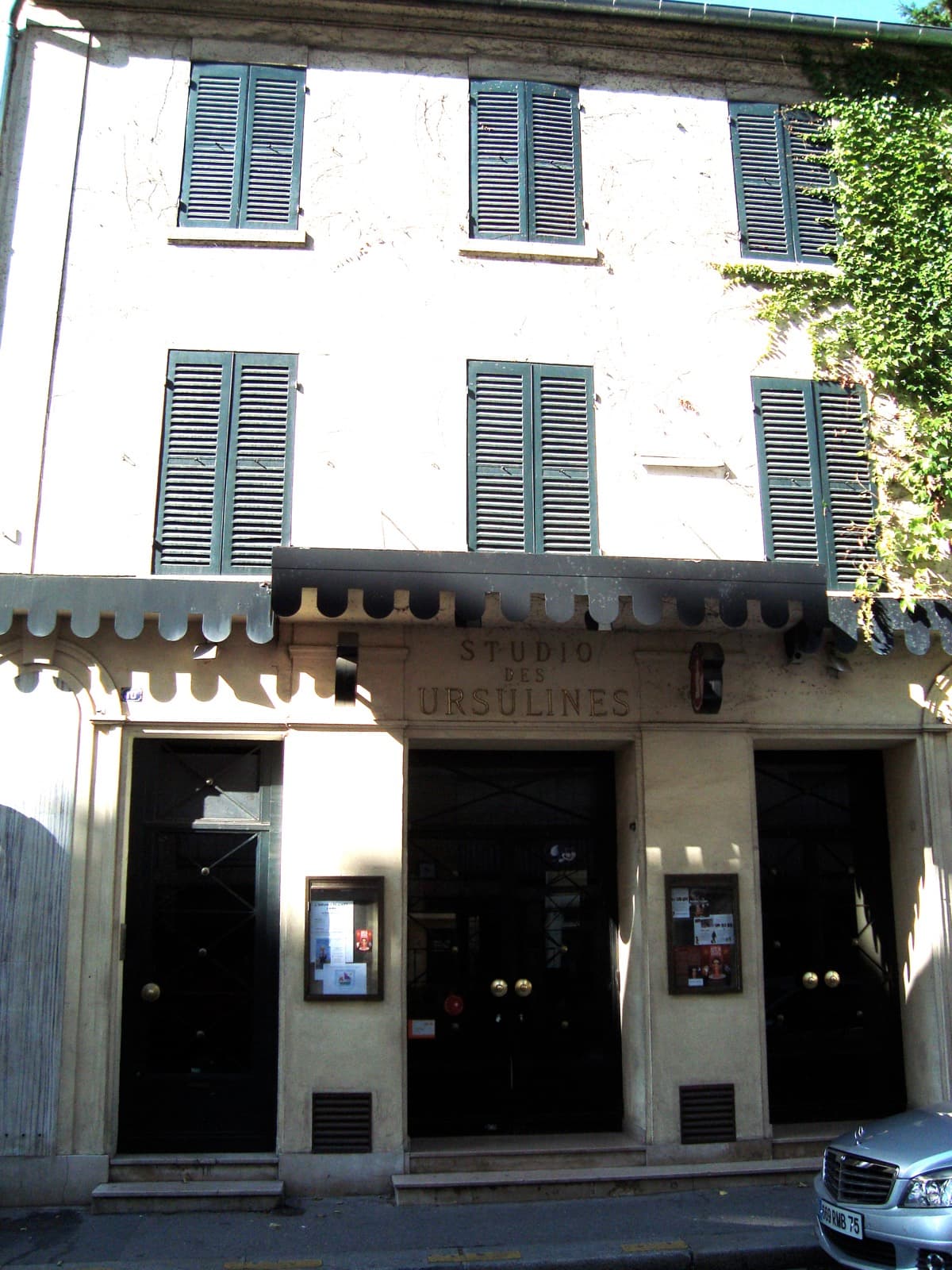 The narrow façade of the Studio des Ursulines cinema on the rue des Ursulines in Paris, photographed in the present day