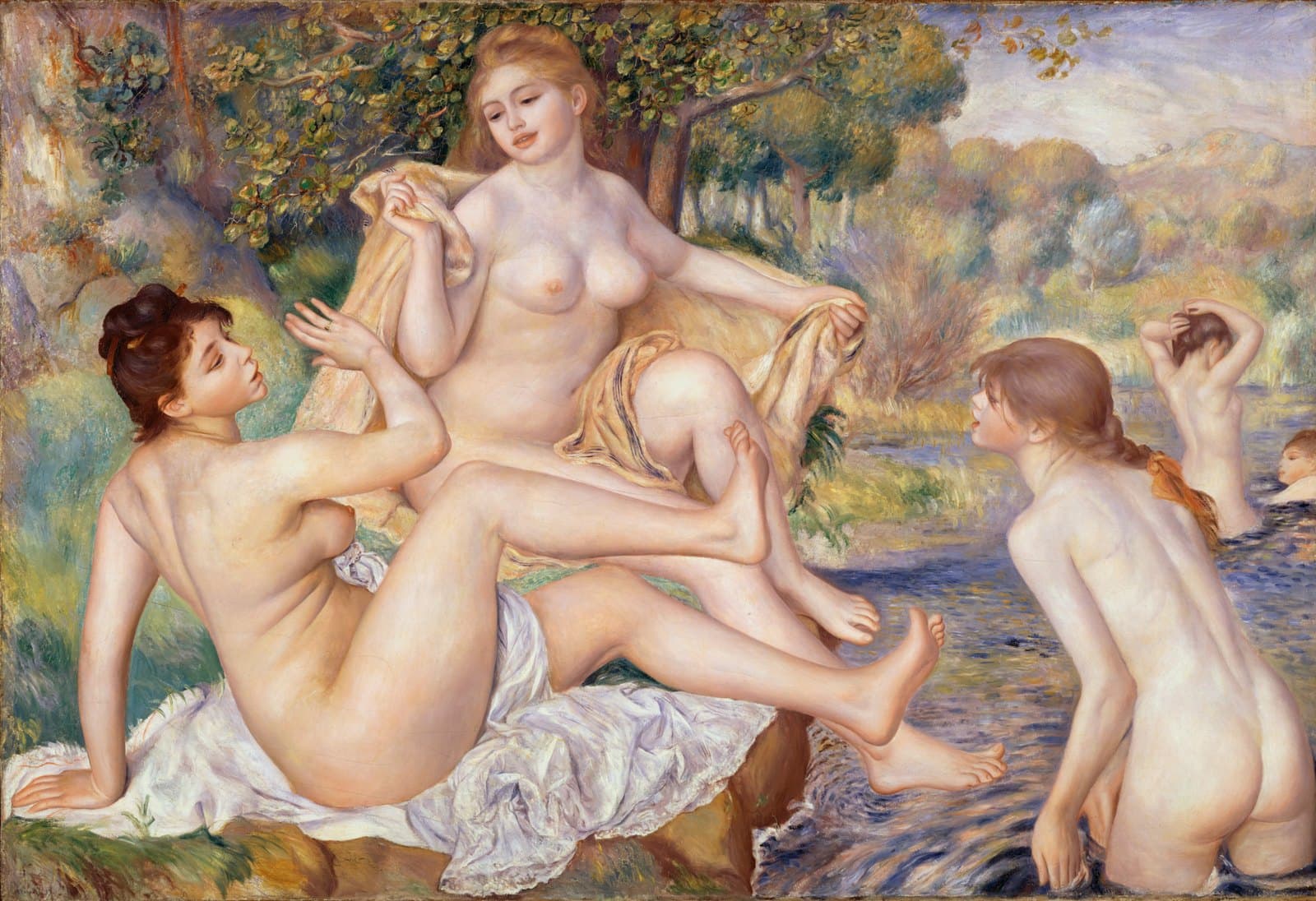 Renoir's The Great Bathers: three sharply modeled nude bathers by a river, one raised to splash another, against a softly brushed landscape