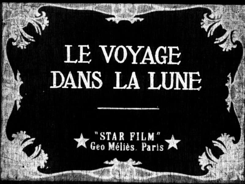 Original title card: LE VOYAGE DANS LA LUNE — 'STAR FILM', Geo Méliès, Paris, between two stars, in an ornamental frame