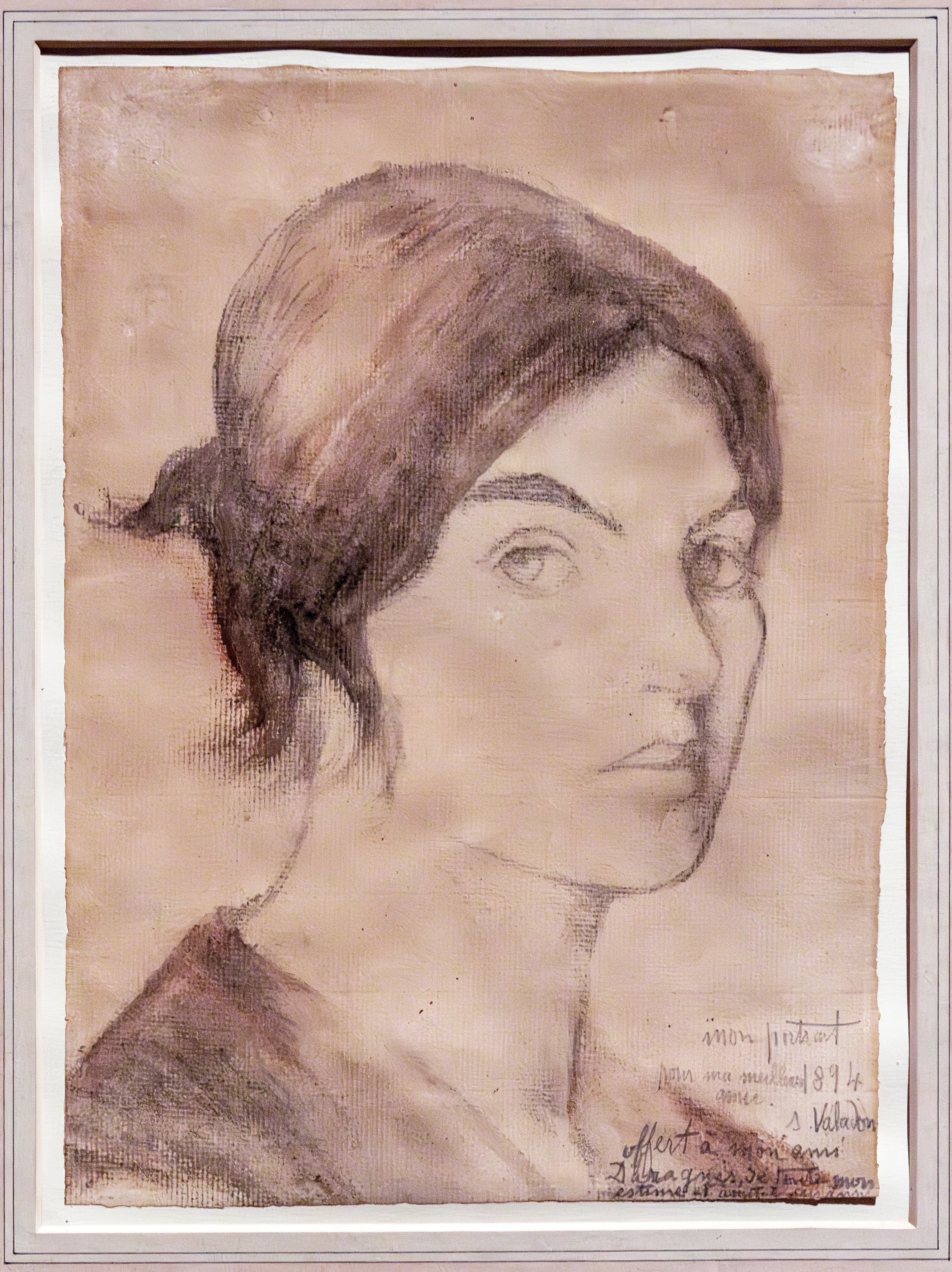 Valadon's pastel self-portrait of 1894: a woman of about twenty-eight with pinned-up hair and a level, unsmiling stare, drawn in profile-turned face against a green ground