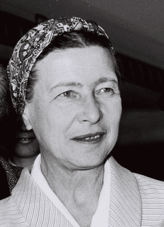 Simone de Beauvoir photographed on 14 March 1967, head-and-shoulders portrait, gathered hair, wearing a dark blouse